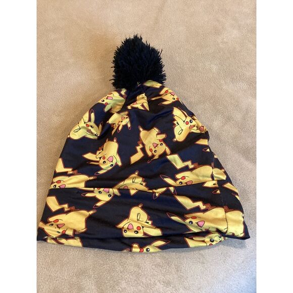 Black with Yellow and red Pokemon print beanie hat with‎ Pom Pom on top - Picture 1 of 7